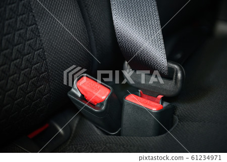 car seat belt while sitting inside the car before 61234971