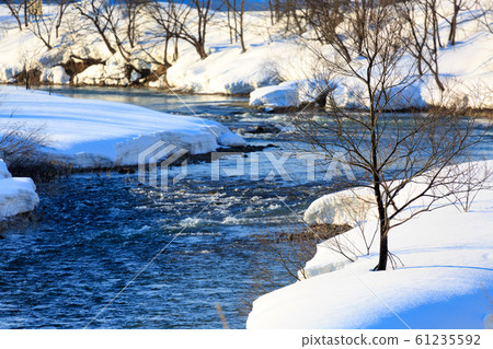 A river in the cold winter Iide-machi, Yamagata Prefecture A river in the cold winter Iide-machi, Yamagata Prefecture 61235592