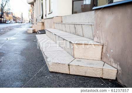 Dangerous stairs. Poor condition of construction. Public building Dangerous stairs. Poor condition of construction. Public building 61237857