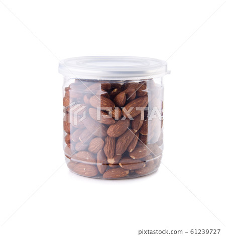 nuts or Almond nuts on a background new. nuts or Almond nuts on a background new. 61239727