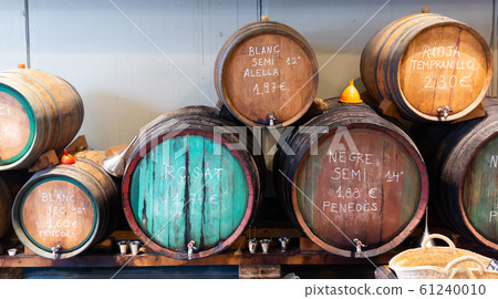 Draft wine from wooden barrels in Catalan store 61240010