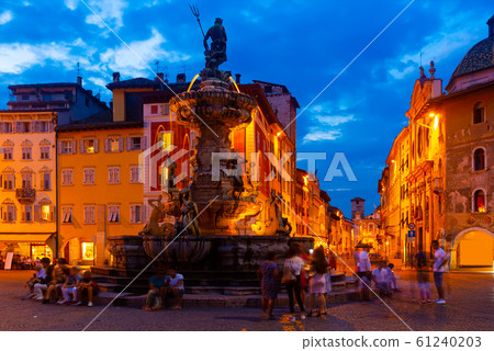 Fountain of Neptune on Piazza Duomo in Trento at twilight 61240203