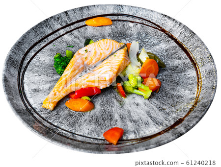 Salmon fish with vegetables served at plate with balsamic Salmon fish with vegetables served at plate with balsamic 61240218