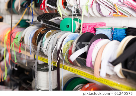 Colorful ribbons on store showcase Colorful ribbons on store showcase 61240575