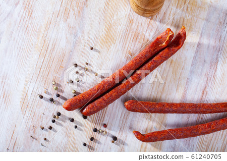 Appetizing smoked sausages for snacks 61240705