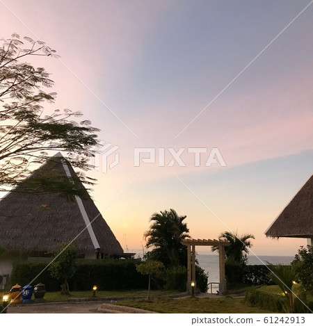 Pink sky seen from Bohol quarter 61242913