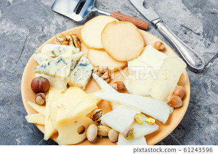 Cheese platter on plate Cheese platter on plate 61243596