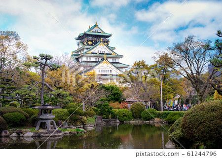 Osaka Castle with Japanese garden and tourist 61244796
