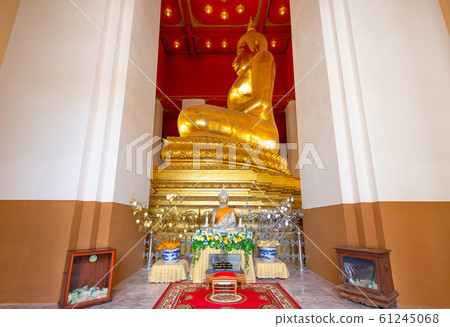 Ayutthaya,Thailand-June 7,2018:Principle Buddha image in a temple at Wihan Phra Mongkol Bophit is a Buddhist temple in the city of Ayutthaya Ayutthaya,Thailand-June 7,2018:Principle Buddha image in a temple at Wihan Phra Mongkol Bophit is a Buddhist temple in the city of Ayutthaya 61245068
