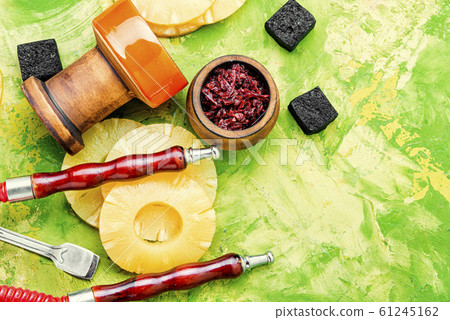 Pineapple flavored hookah. 61245162