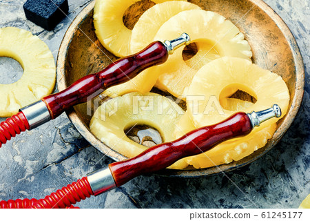 Pineapple flavored hookah. 61245177