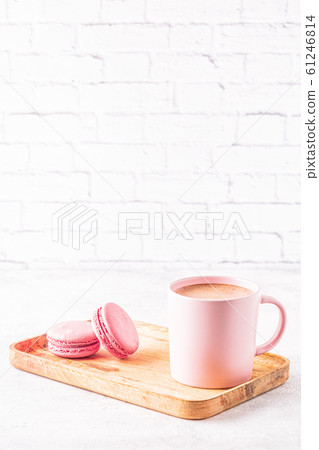 French macaroons and cup of coffee. French macaroons and cup of coffee. 61246814