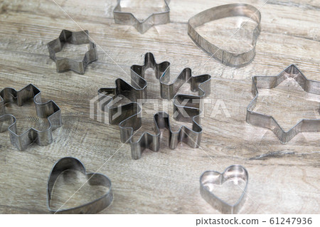 Christmas bake tools for cookie and cake mould for muffin and cupcake on white wooden background 61247936