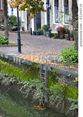 Quayside with a safety ladder in Dordrecht 61248516