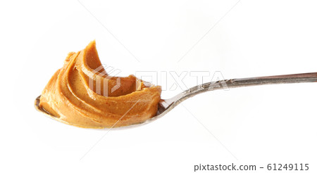 spoon of peanut butter 61249115
