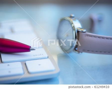 Business image, keyboard, clock, woman Business image, keyboard, clock, woman 61249410