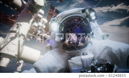Astronaut at spacewalk. Elements of this image 61249855