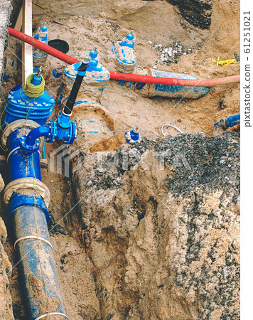 Blue water pipes and shut-off valve on pipe with 61251021