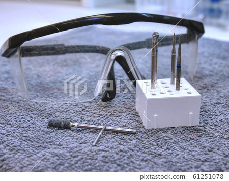 Detail of tools in modern dental clinic office Detail of tools in modern dental clinic office 61251078