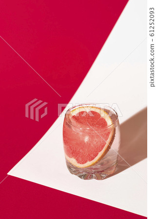 Grapefruit drink with tonic water. Summer beverage Grapefruit drink with tonic water. Summer beverage 61252093