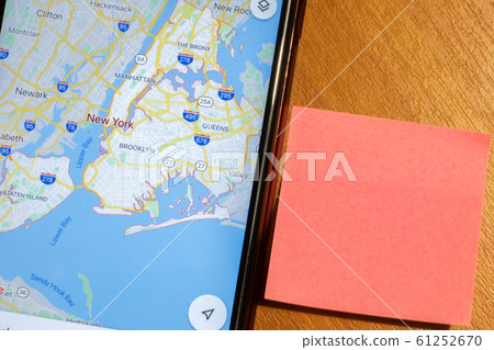 Map of New York city on phone screen close-up top view with copy space 61252670