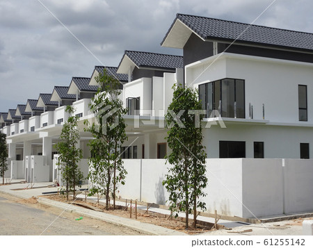 Double story luxury terrace house under construction in Malaysia.  Designed by an architect with a modern and contemporary style.  61255142