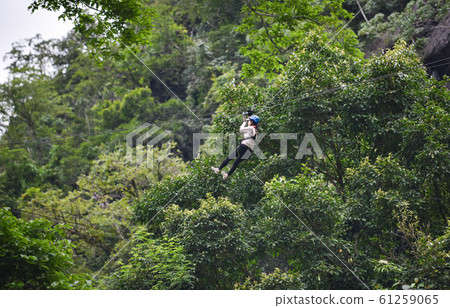 Zipline exciting sport adventure activity hanging 61259065