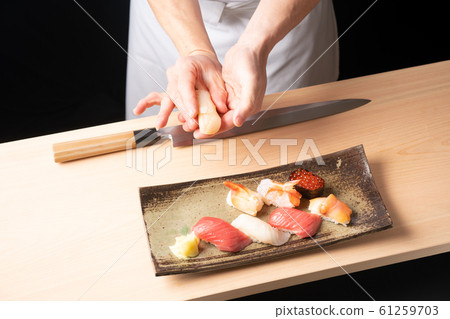 Bamboo grasping sushi Bamboo grasping sushi 61259703