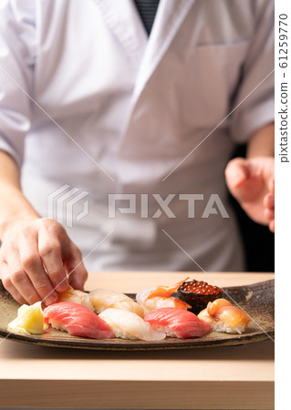 Bamboo grasping sushi Bamboo grasping sushi 61259770