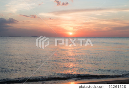 Sea pink sunset. Beautiful color clouds. 61261828