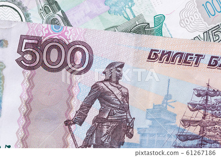 Russian ruble. Russian currency closeup in the form of texture. 61267186