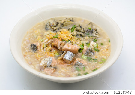 Seafood boiled rice with Salmon and Oysters 61268748