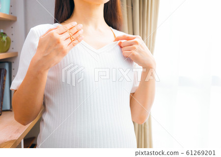 Pregnant woman sweating 61269201