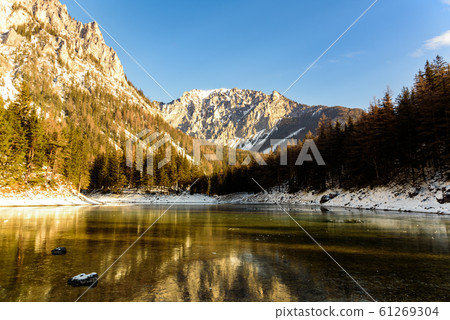 Peaceful mountain view with famous green lake in Austria Styria. Tourist destination lake Gruner See in winter. Peaceful mountain view with famous green lake in Austria Styria. Tourist destination lake Gruner See in winter. 61269304