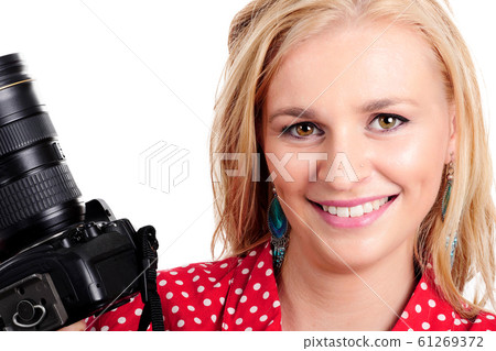 pretty blonde woman photographer with her camera pretty blonde woman photographer with her camera 61269372
