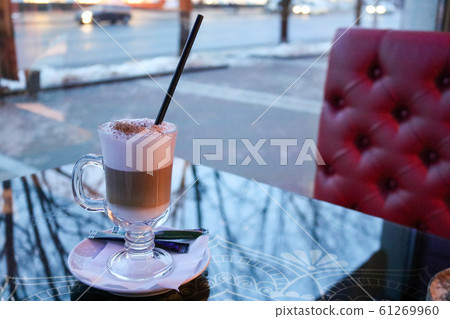 A cup of hot, brown tasty cappuccino A cup of hot, brown tasty cappuccino 61269960