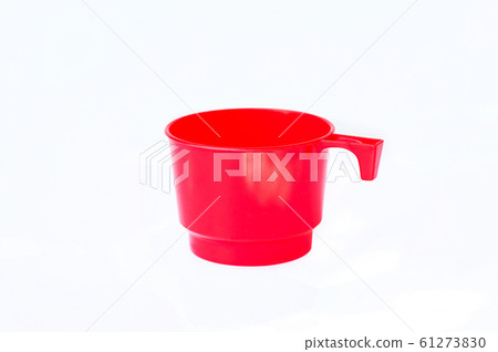 Red plastic mug empty blank for coffee or tea isolated on white background Red plastic mug empty blank for coffee or tea isolated on white background 61273830