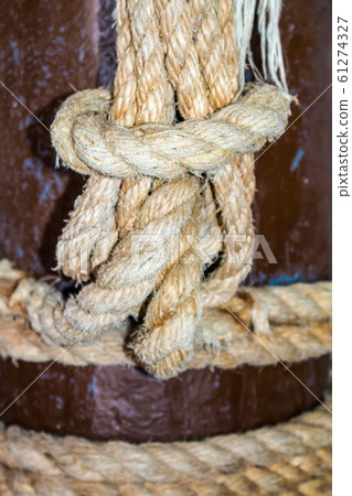 jute tackle ropes, blurred selective focus. jute tackle ropes, blurred selective focus. 61274327