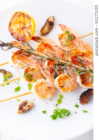 grilled shrimp on skewers. Grilled seafood on 61275205