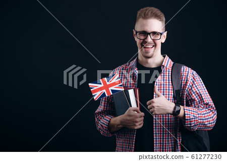 Young Male English Student Showing Thumb Up 61277230