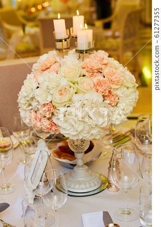 The luxury, elegant wedding reception table arrangement. The luxury, elegant wedding reception table arrangement. 61277355