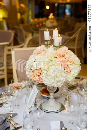 The luxury, elegant wedding reception table arrangement. The luxury, elegant wedding reception table arrangement. 61277365