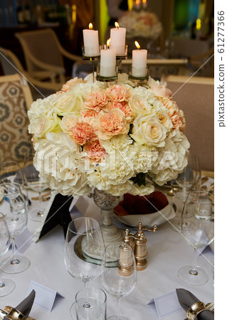The luxury, elegant wedding reception table arrangement. 61277366
