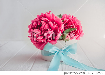 Close up beautiful pink peony flower bouquet in 61280256