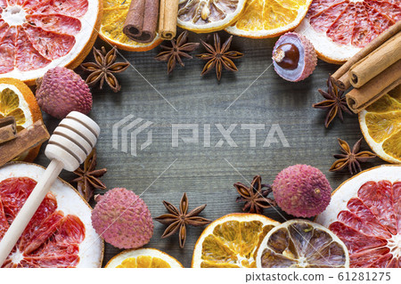 lychee fruits with dried orange and grapefruit slices on wooden background. copy space 61281275