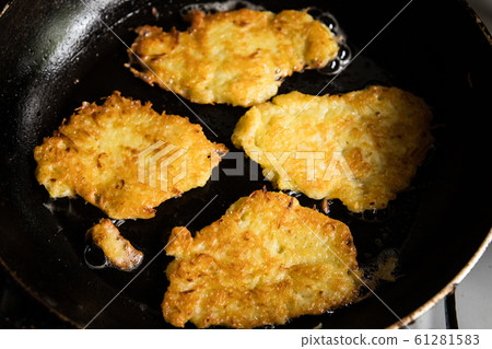 potato pancakes on pan potato pancakes on pan 61281583