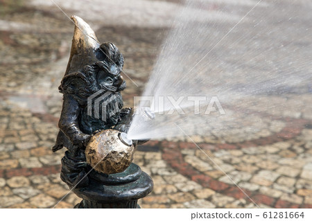 metal dwarf gnome sculpture, symbol of Wroclaw, Poland metal dwarf gnome sculpture, symbol of Wroclaw, Poland 61281664