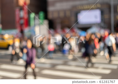 blurred abstract people and car moved at city 61281767