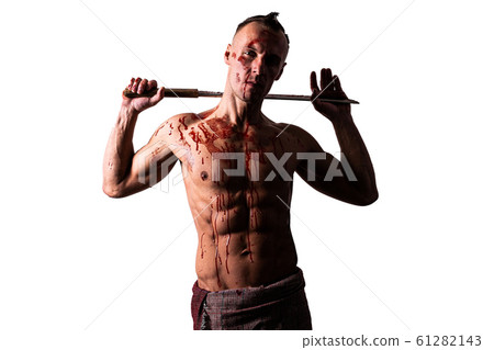 A man with a sword behind his neck. Isolated on a white background. 61282143