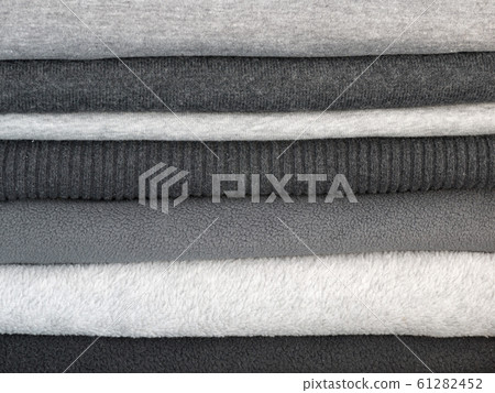 Stack of warm gray clothes Stack of warm gray clothes 61282452